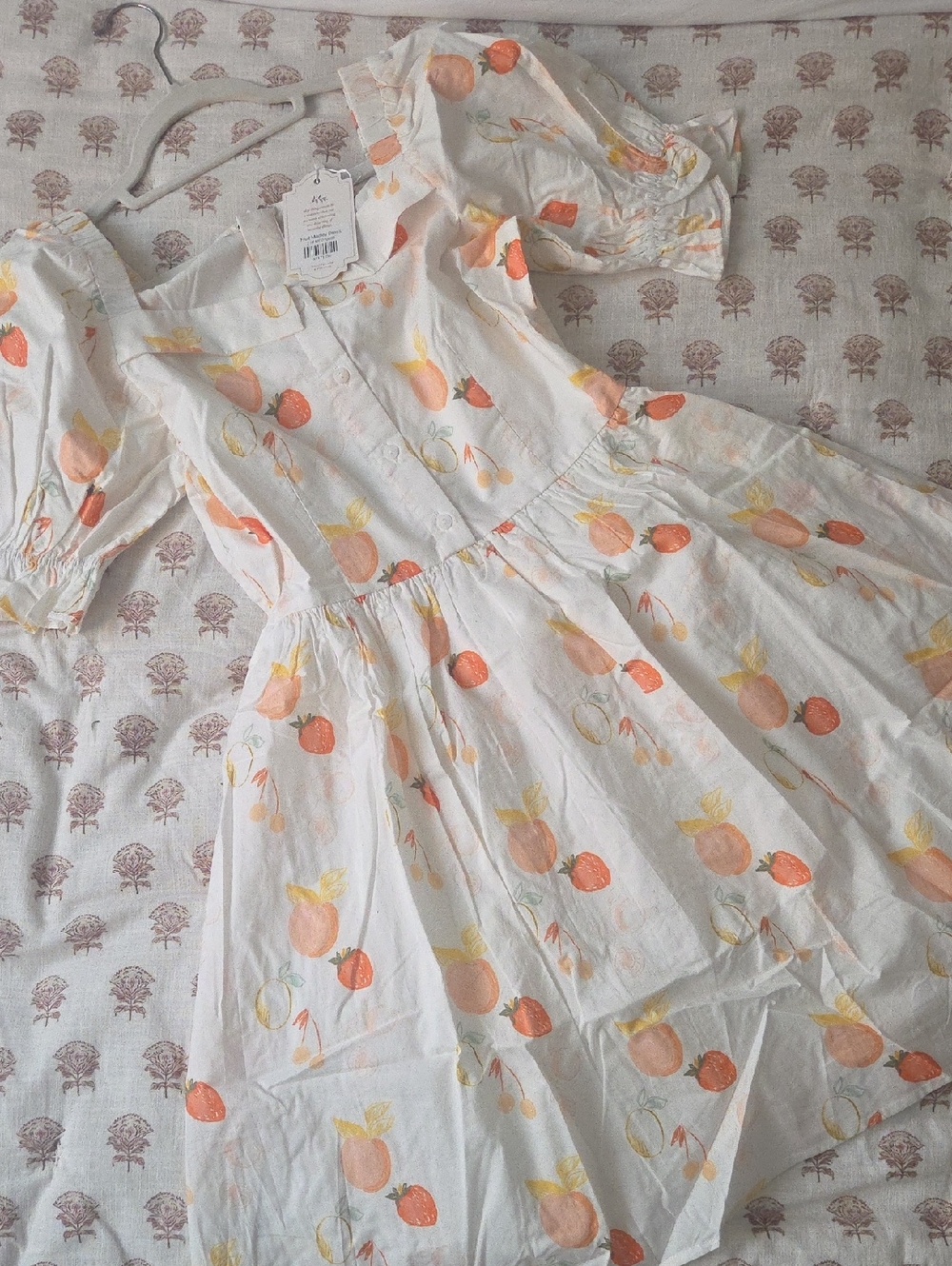 Ivy City Co Fruit Medley Mini Dress with a colorful fruit print by Celeste Clark